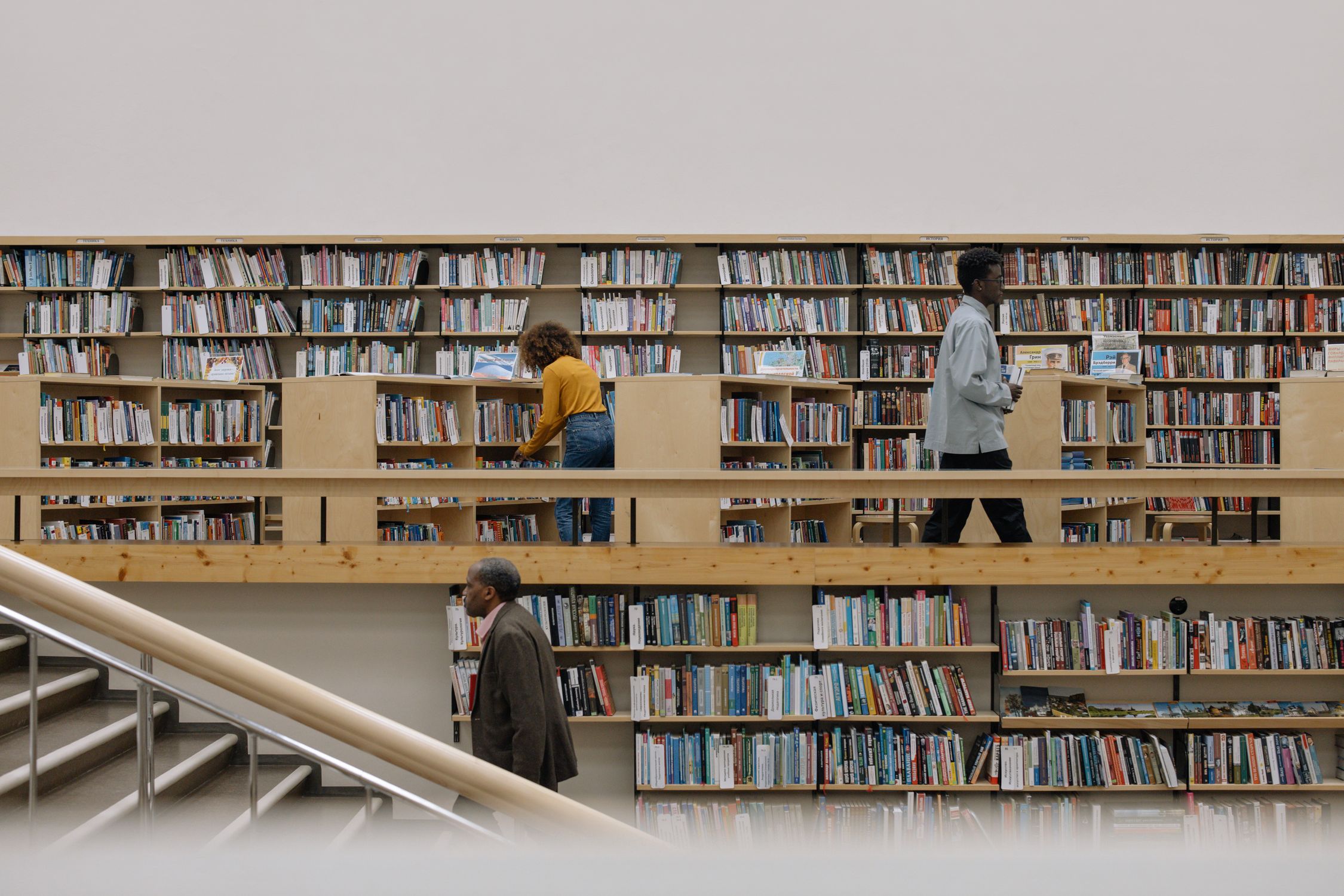 Humans In Library People Inside a Library · Free Stock Photo