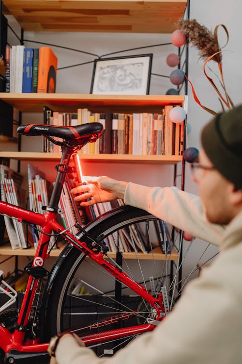 Man with Bike in Home Interior