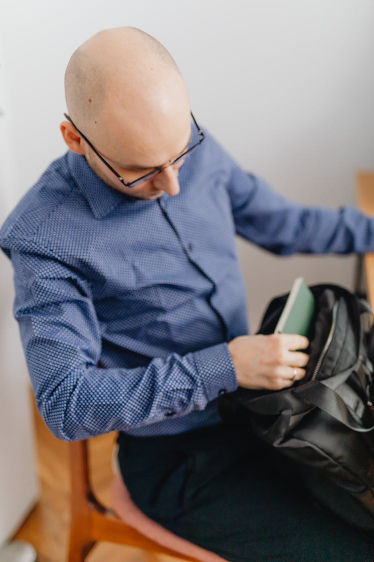 Man With Bag In Office