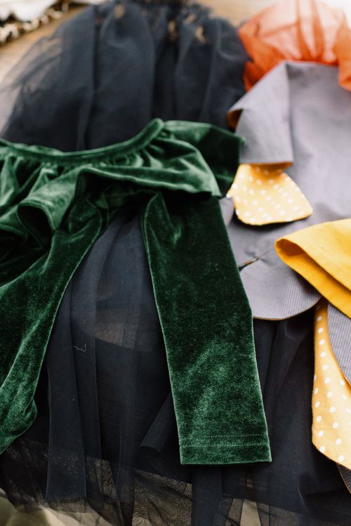 Free Close-up of assorted colorful velvet and tulle fabrics used in kids fashion design. Stock Photo