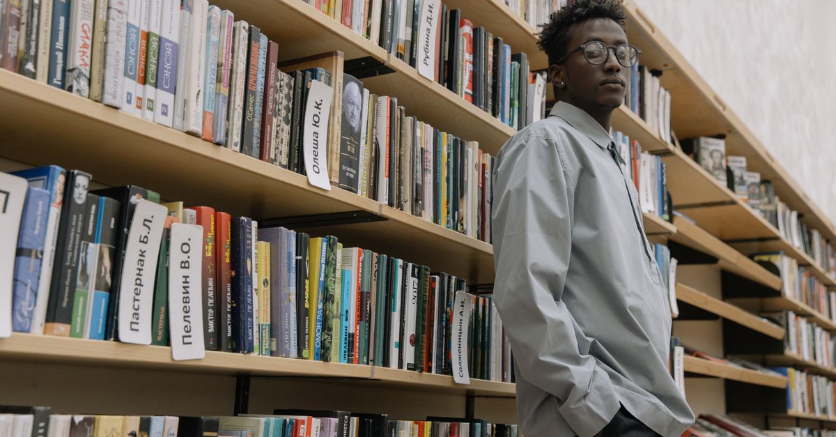 Library Core Man A Man Inside a Library · Free Stock Photo
