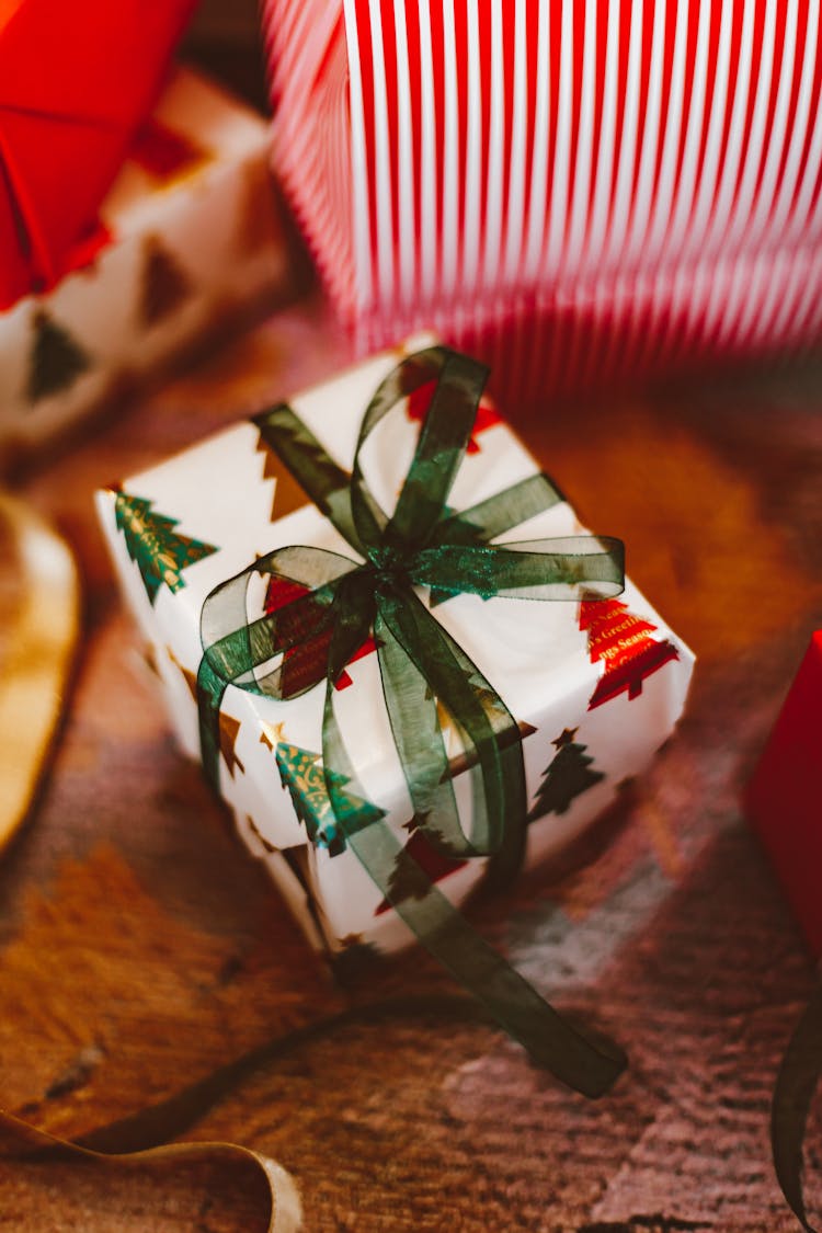 A Wrapped Christmas Gift With Ribbon