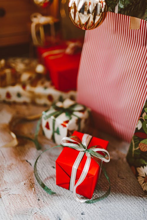 Free A Red Box with Ribbons on Top Stock Photo