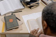 Person Holding White Printer Paper