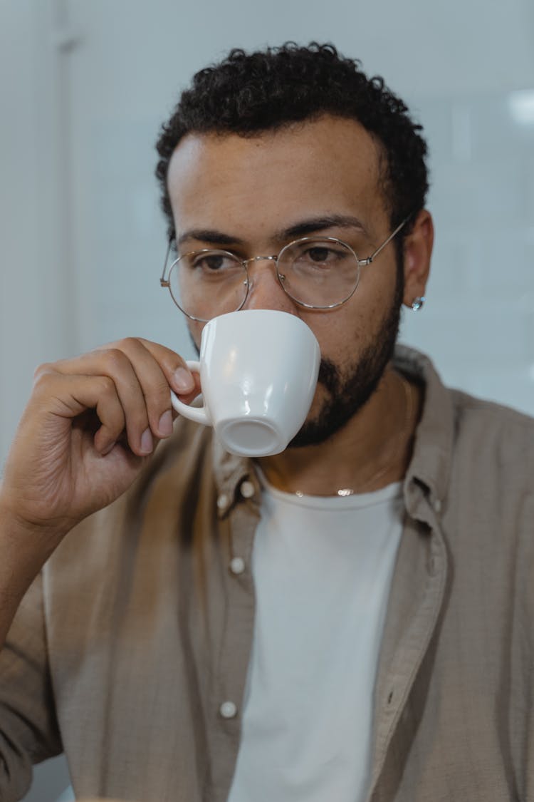 Man Drinking A Cup Of Tea