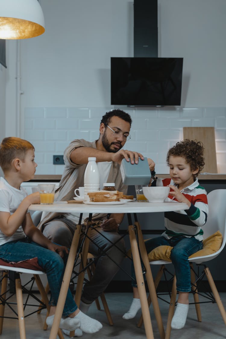 Father Having Breakfast With His Two Children