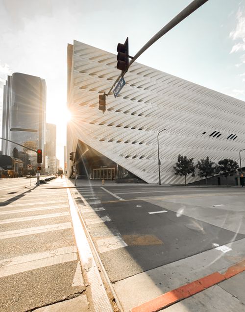 Free A striking urban scene featuring modern architecture and sunbeams in a city setting. Stock Photo