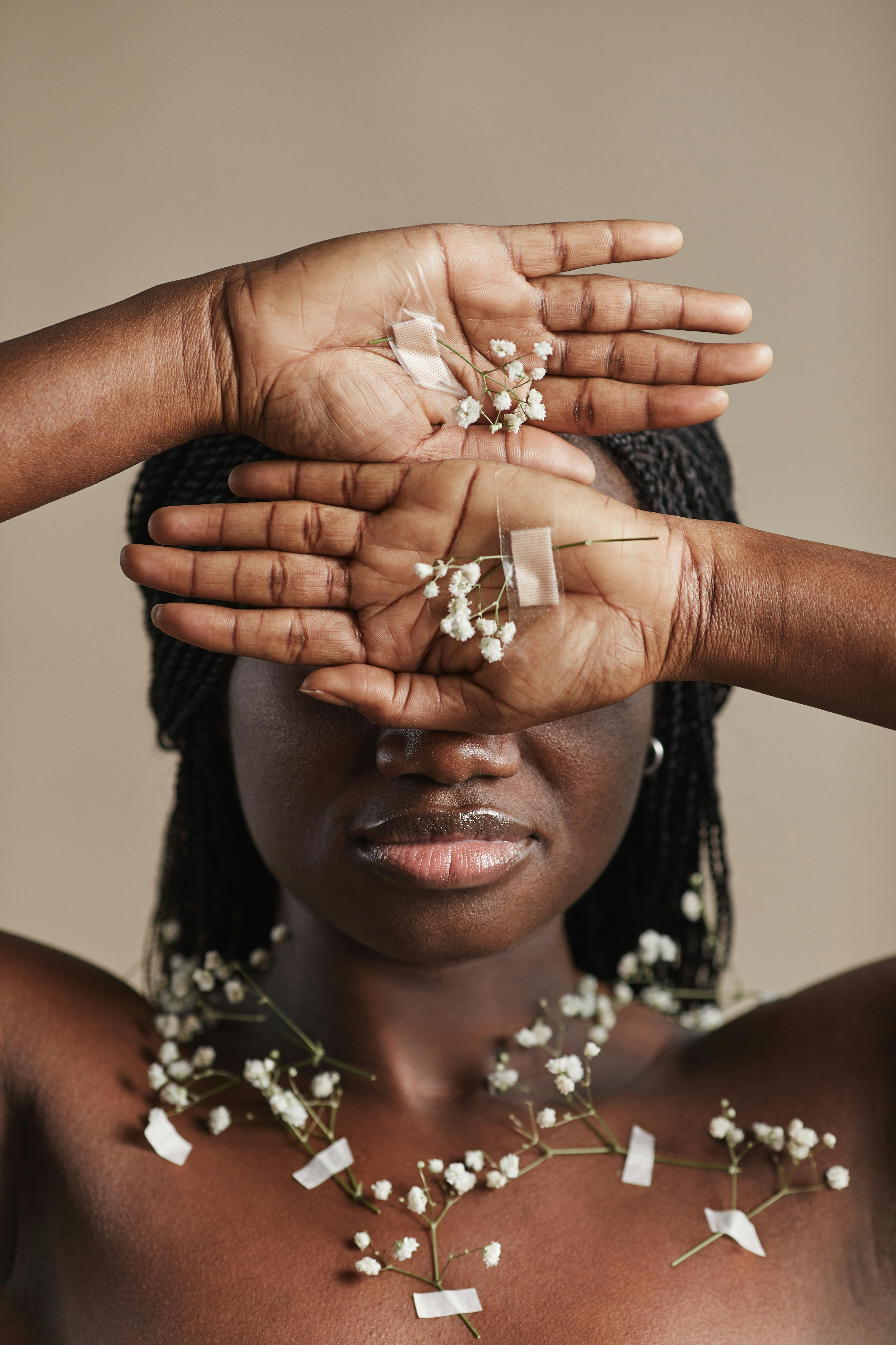 woman with flowers on her palms