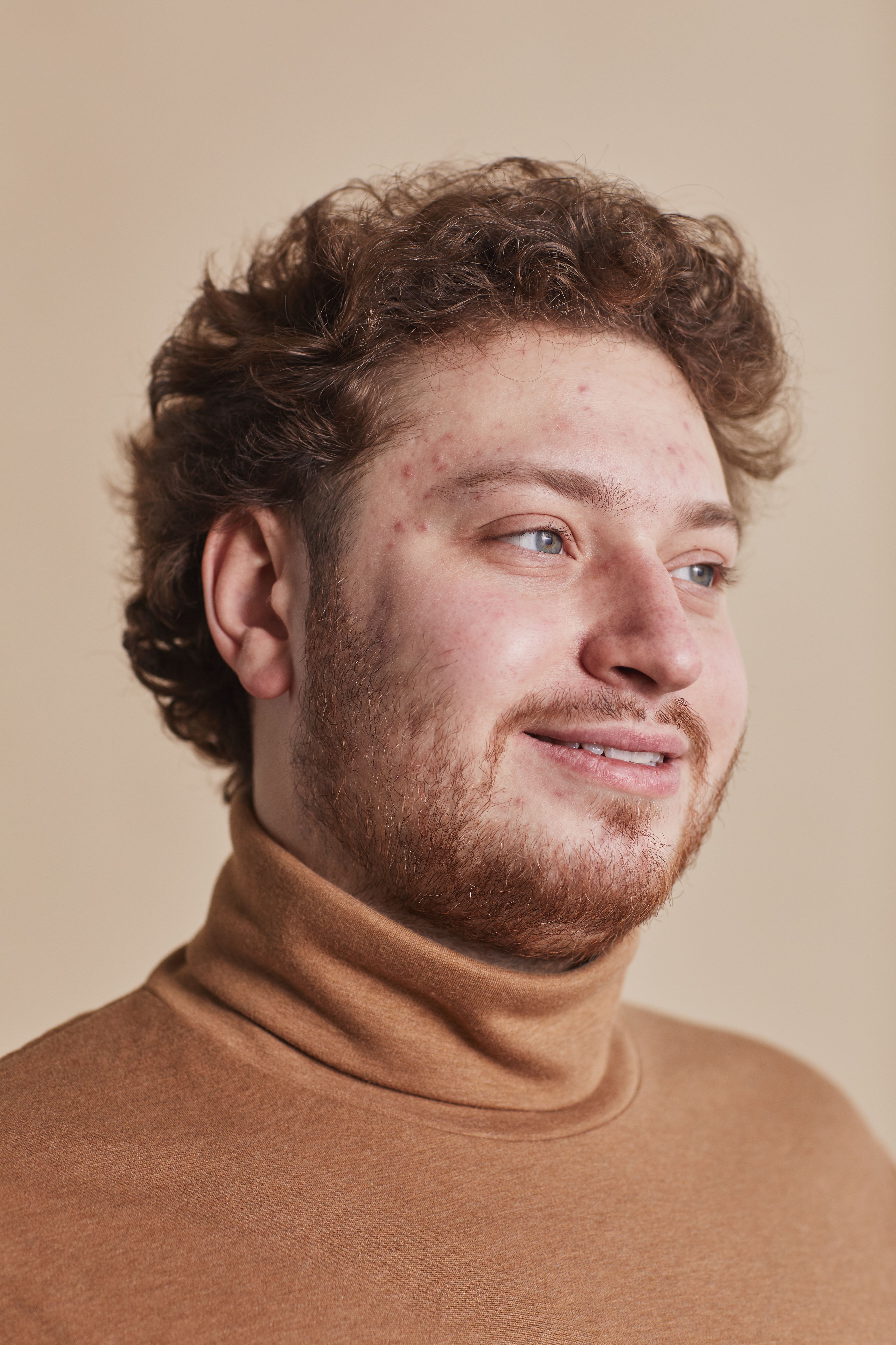 A Man in Brown Turtleneck Shirt · Free Stock Photo