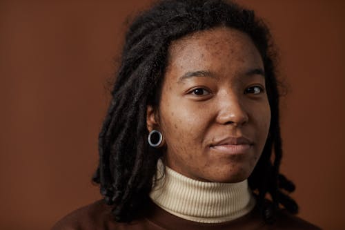 A Woman in Beige Turtleneck Shirt