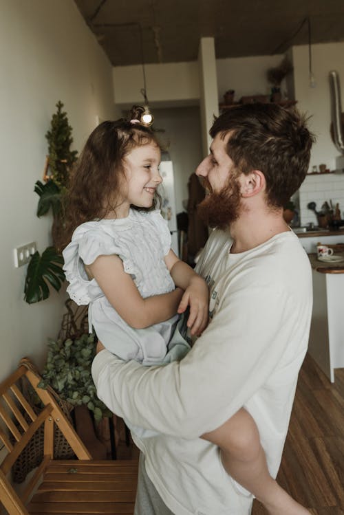 Free Dad Carrying His Daughter Stock Photo