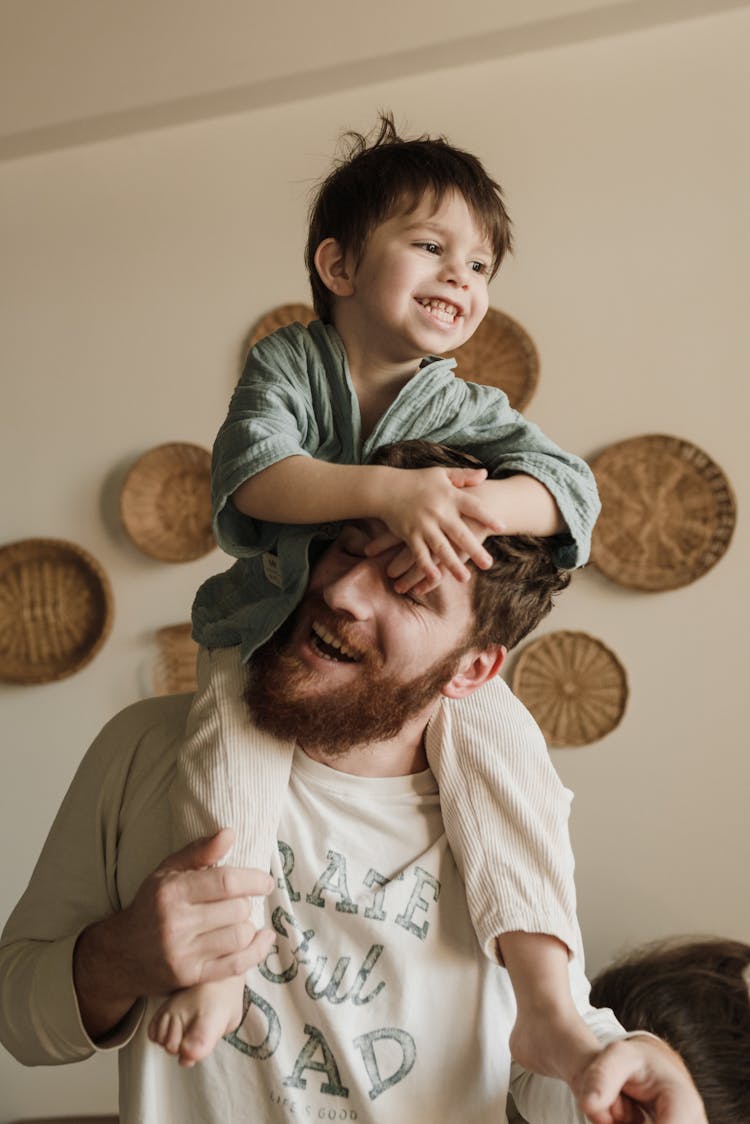 Father And Son Playing Together