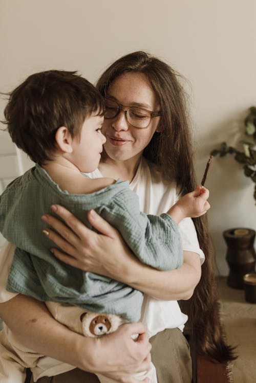 Person Carrying a Boy