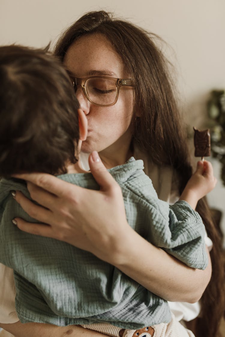 A Mom Kissing Her Son