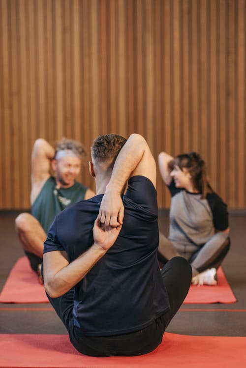 Back View of a Man Stretching His Arms