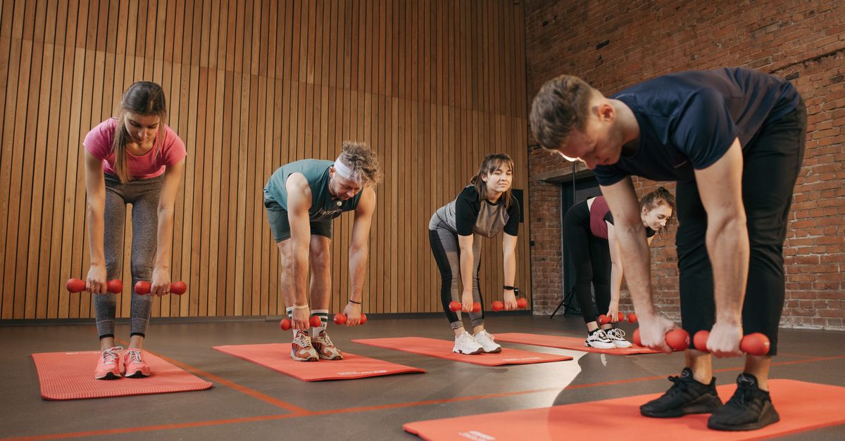 Fitness instructor leading a small group training session