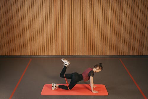 Person in Black Leggings Doing Leg Exercise with a Resistance Band · Free  Stock Photo