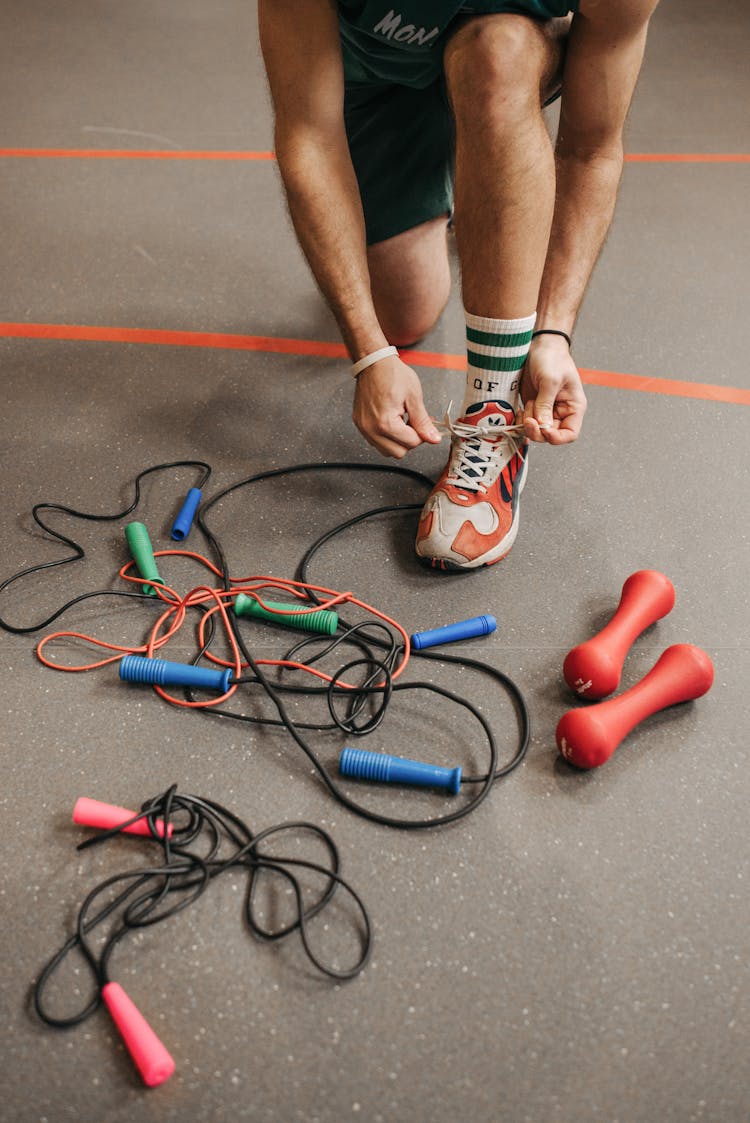 Person Tying His Shoelaces