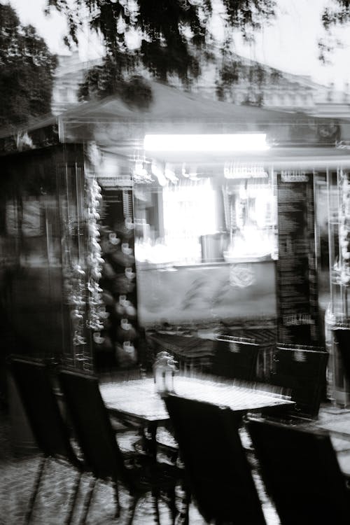 Free Black and White Long Exposure Shot of a Restaurant Stock Photo