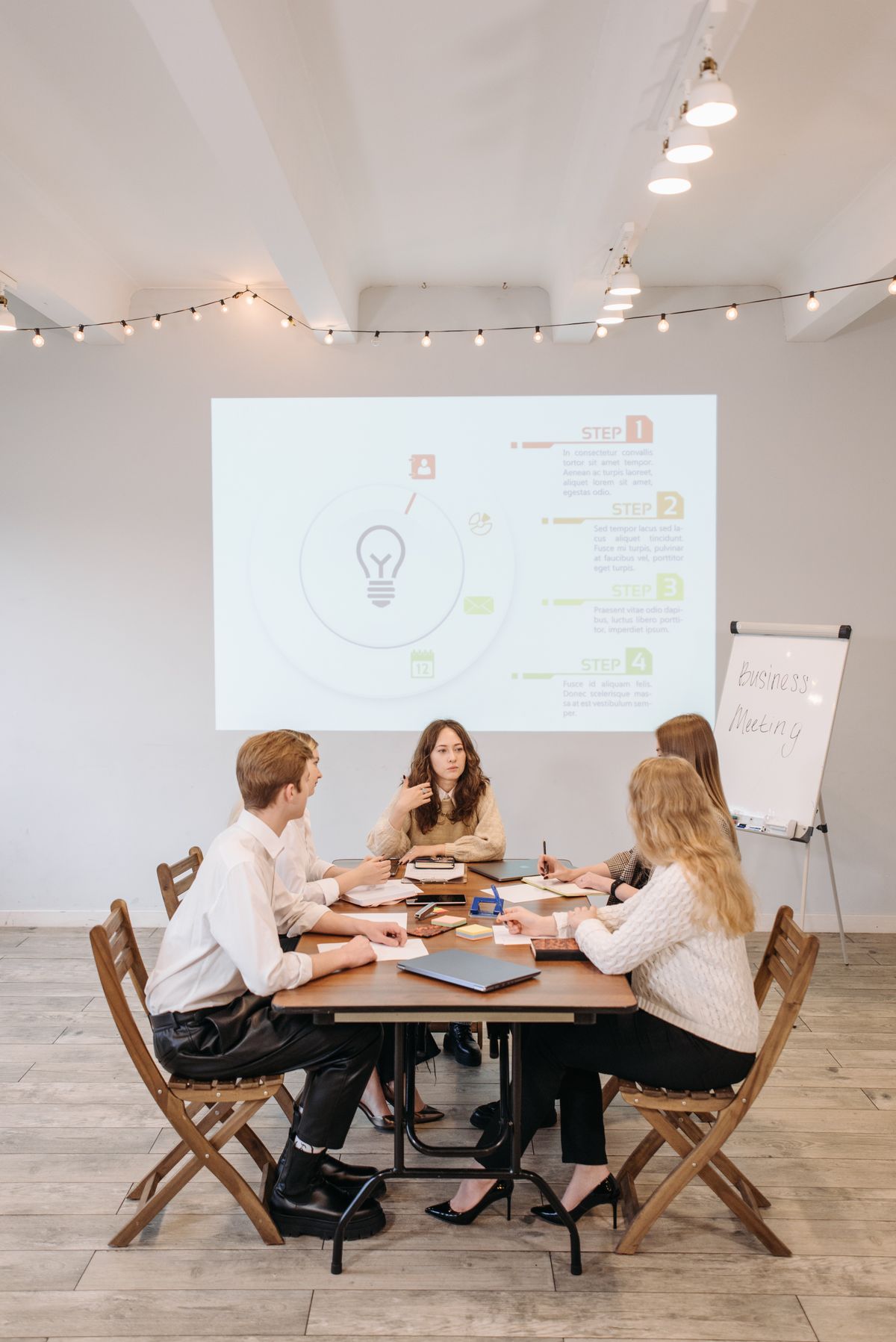 Professionals discussing strategy in a modern office