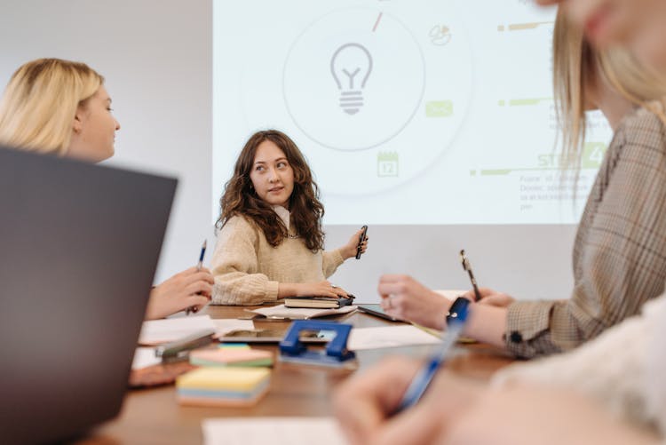 Employees In The Room Having A Board Meeting