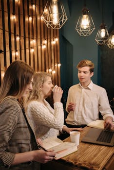 Business team engaged in a collaborative discussion at a cozy office space.