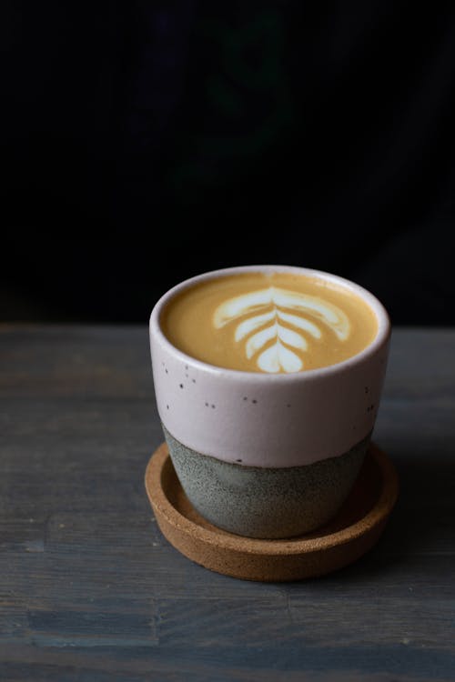 Free Cup of fresh cappuccino on table Stock Photo