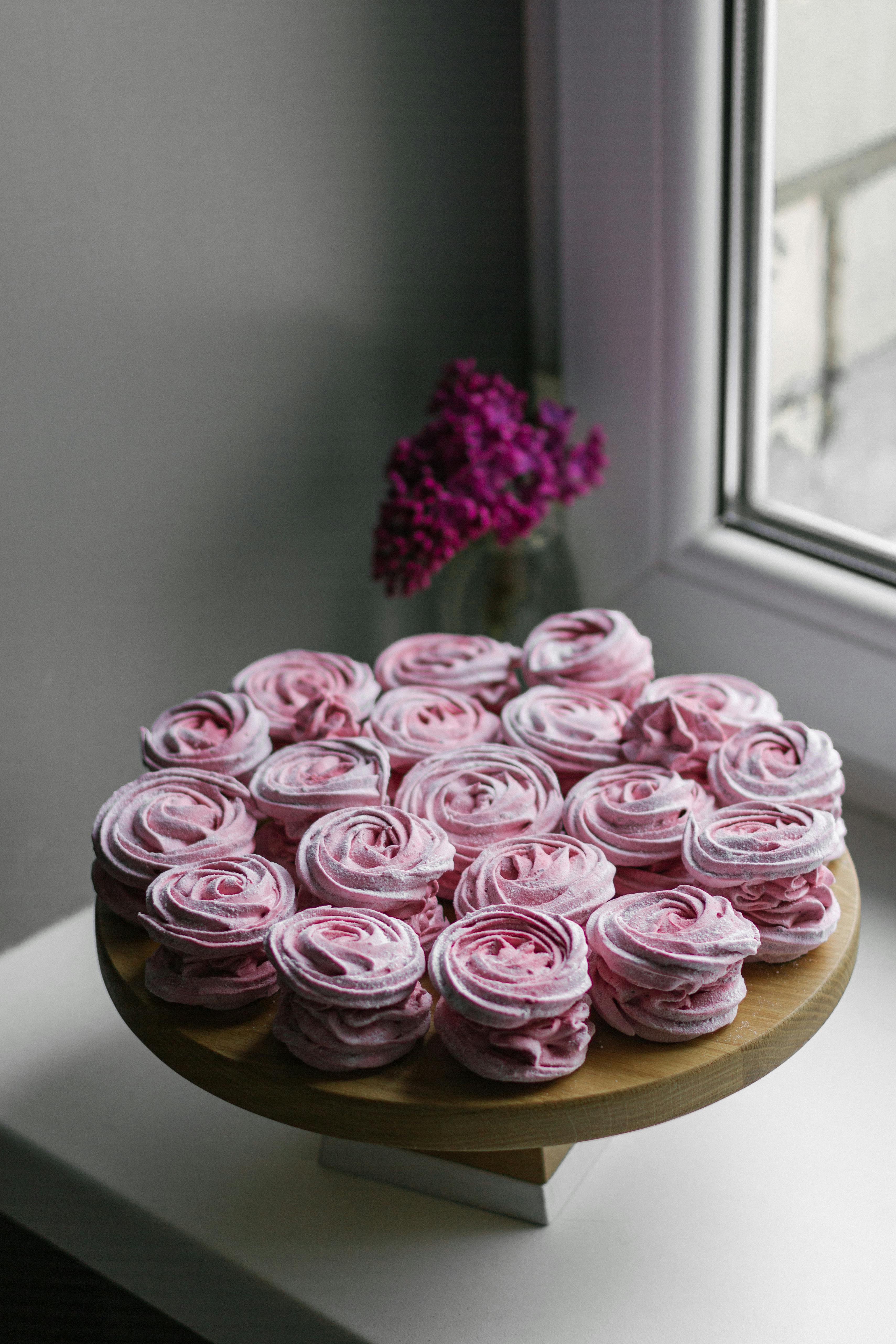 sweet zephyr for dessert near flowers in glass vase