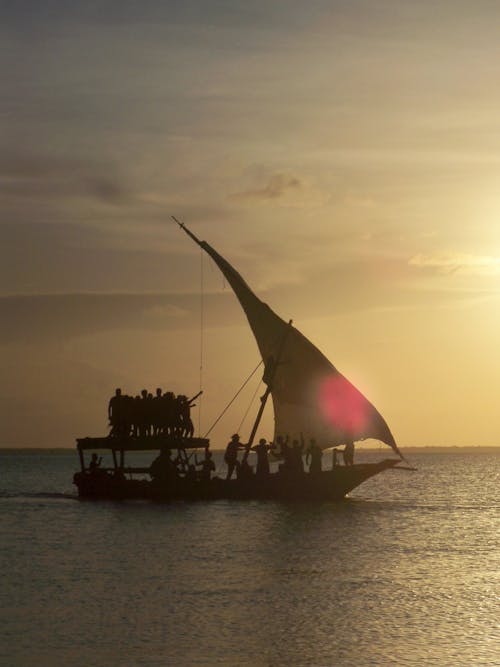 Photos gratuites de bateau, coucher de soleil, mer