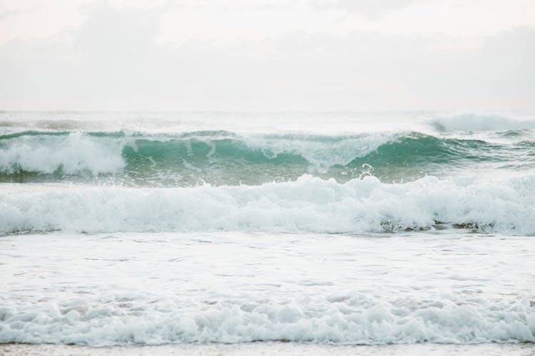 Soothing Waves Crashing On Beach Shore