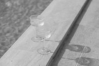 Clear Wine Glasses on a Concrete Surface