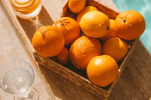 Gratis arkivbilde med appelsiner, betongoverflate, ferske frukter
