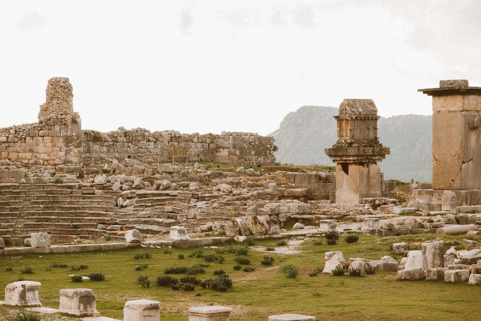Explore ancient ruins of an amphitheater with stunning stone architecture.