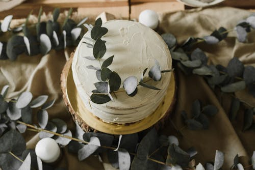 Free Green Leaves Around a Cake Stock Photo