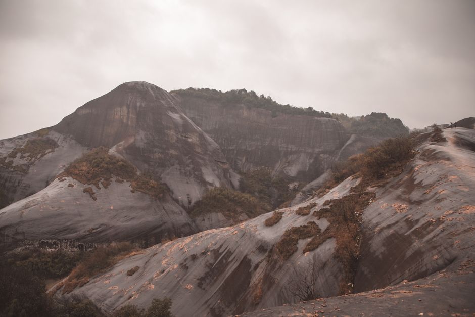 Captivating view of rugged mountain peaks during a serene dusk hour.