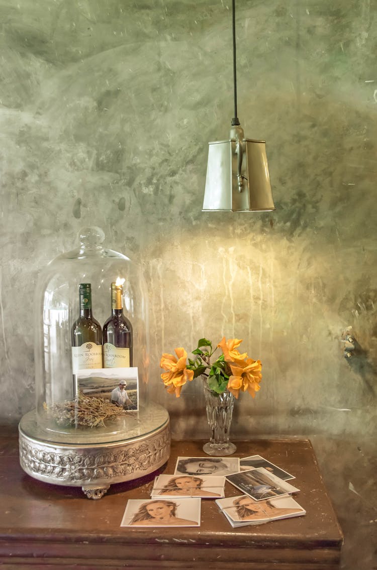 Photographs On Brown Wooden Table