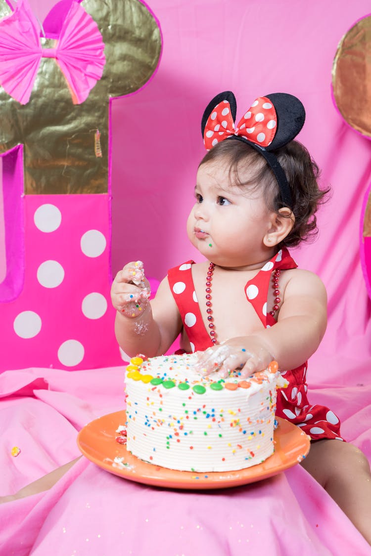 A Baby Eating Cake