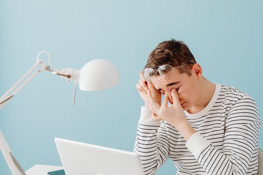 Tired Man with Laptop