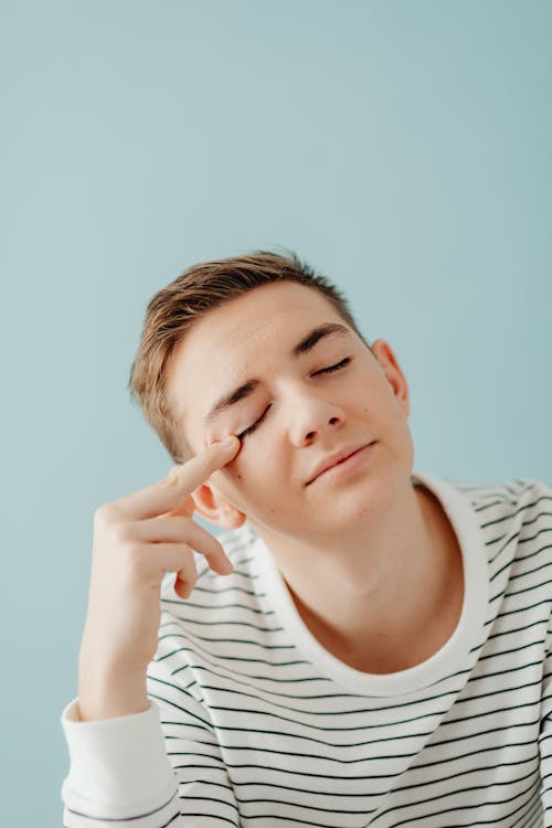 Portrait of a Teenager with Closed Eyes