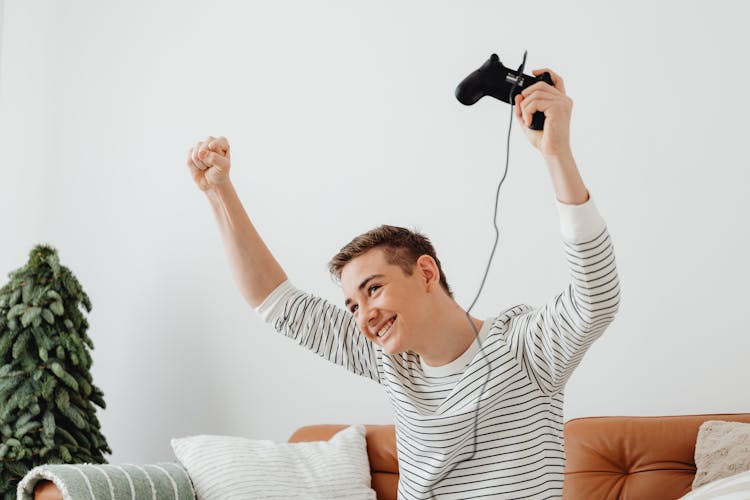 Overjoyed Guy Playing Video Game