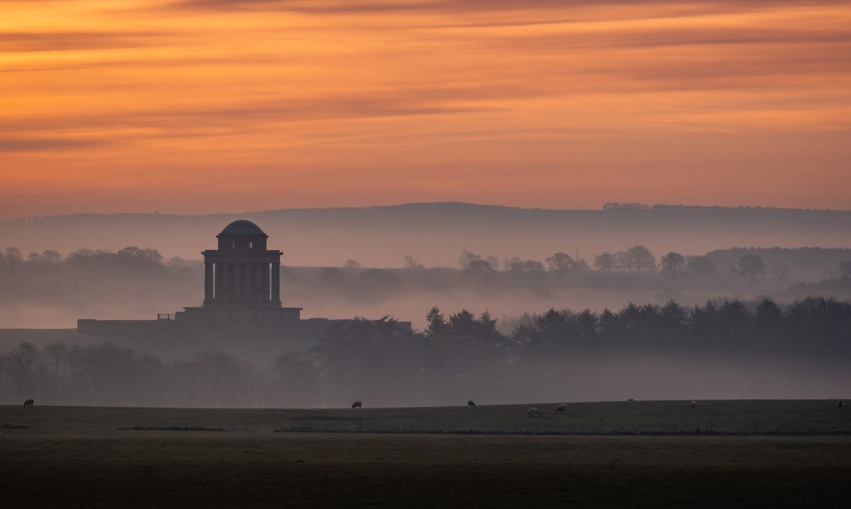 Content creator recording a video tutorial about AI tools in a home studio
