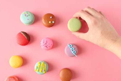 Close-Up Shot of Delicious French Macarons on Pink Surface