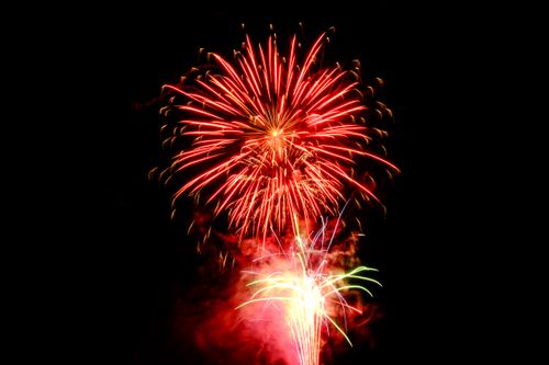 Free Bright and colorful fireworks exploding against a dark night sky, perfect for celebrating special occasions. Stock Photo
