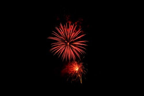 Free Colorful fireworks explode brightly in the night sky, capturing the essence of celebration. Stock Photo