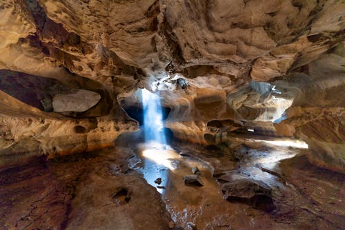 Photo of a Cave with Rocks