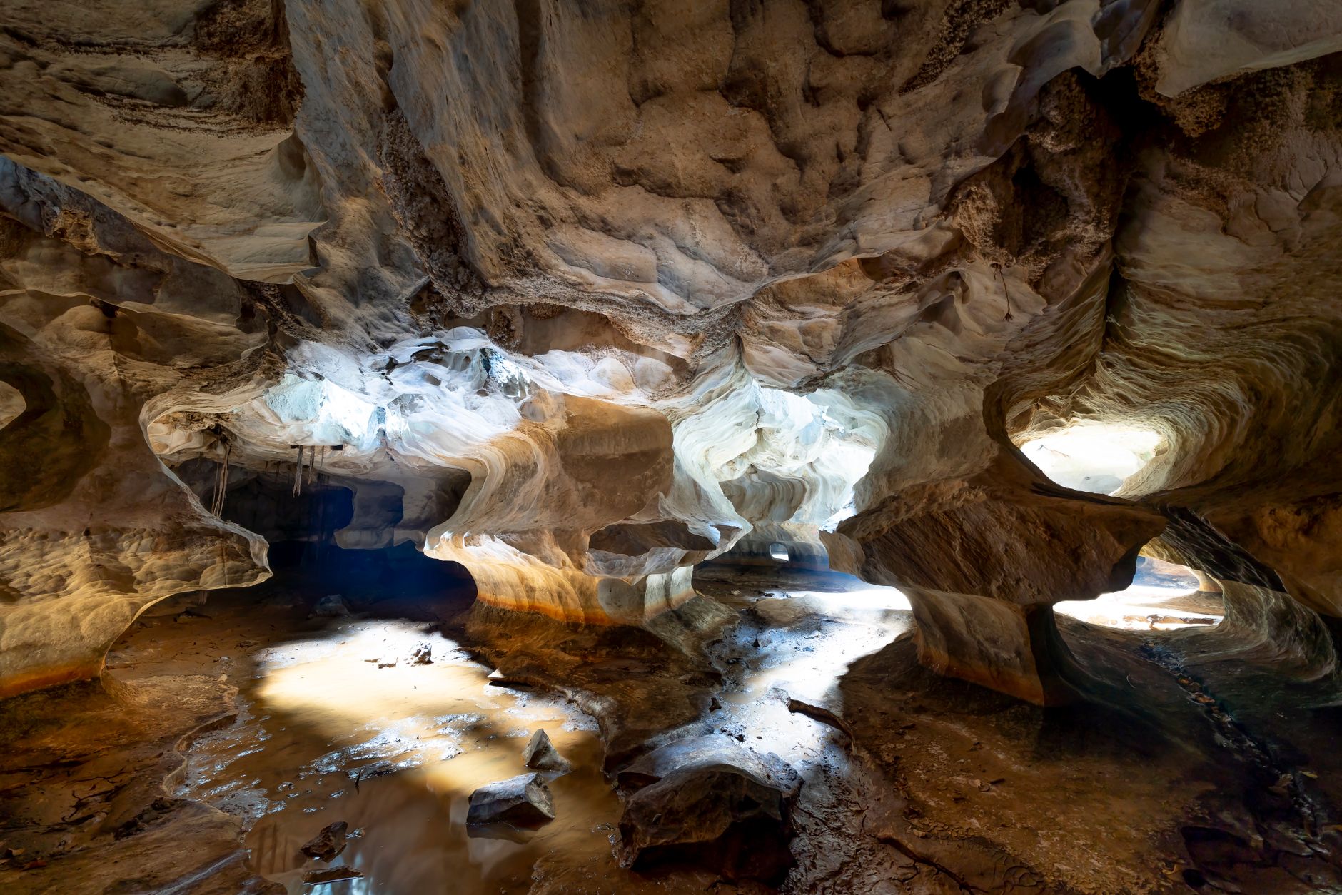 Explore the stunning natural rock formations and light play in this Kien Giang cave.