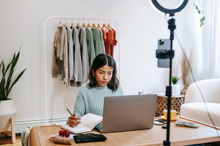 Focused Blogger Working On Project At Home