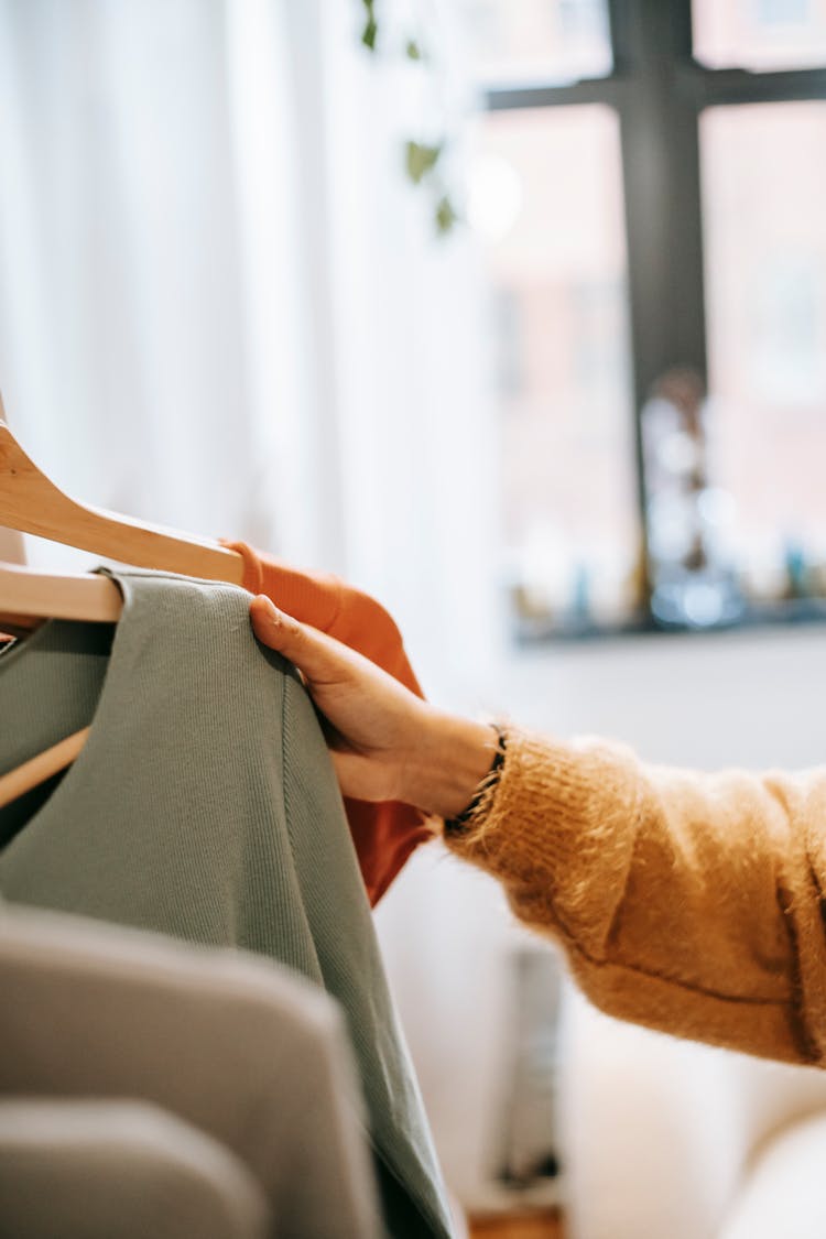 Faceless Woman Choosing Wear In House Room