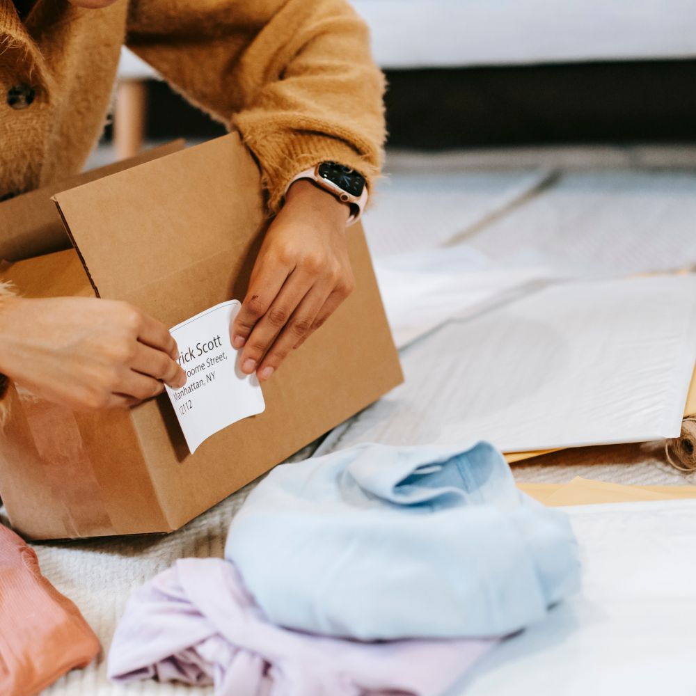 Docking — professional packers wrapping and boxing belongings