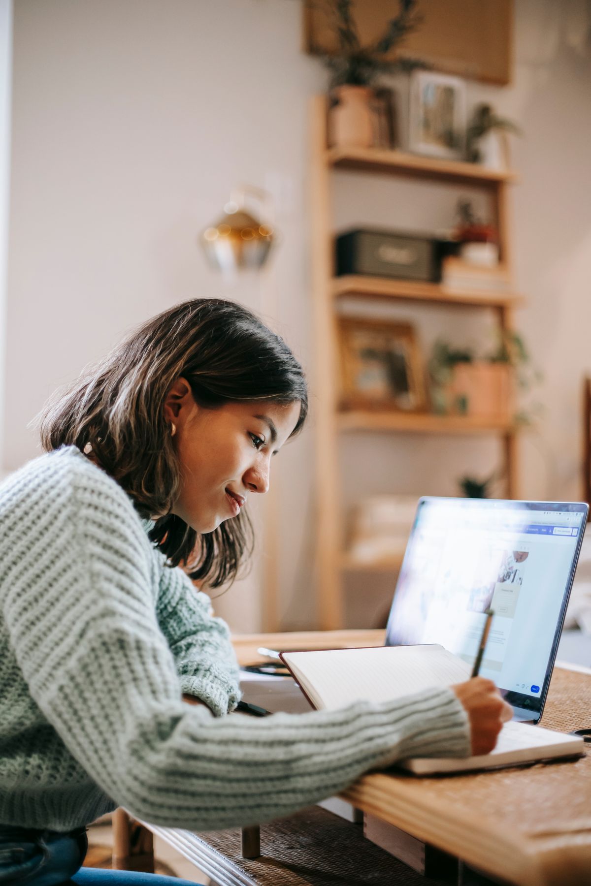 Aspiring AI consultant comparing certification programs on a laptop